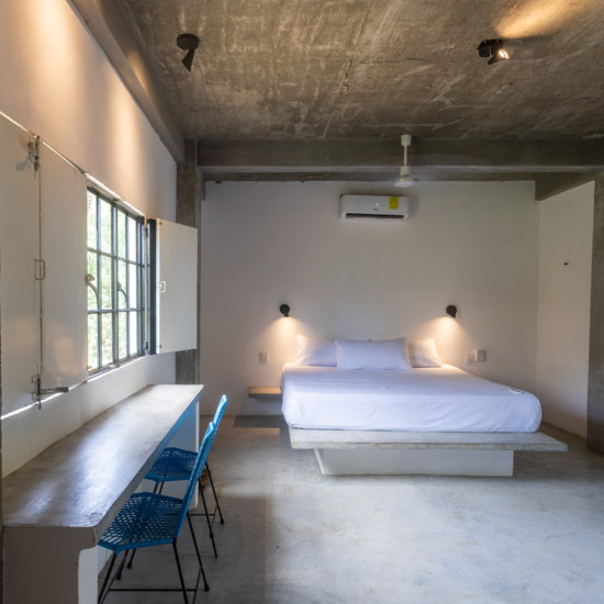 Open closet and storage area leading into Soirée’s air-conditioned King Bedroom
